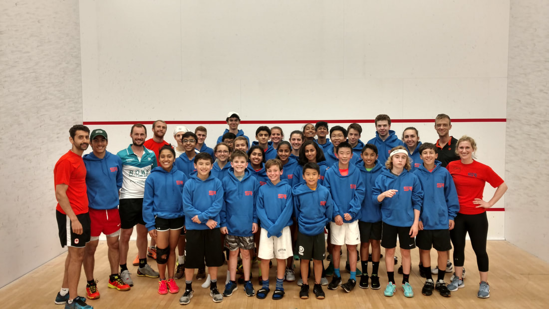 Squash camp players on the courts at Squash Revolution in DC